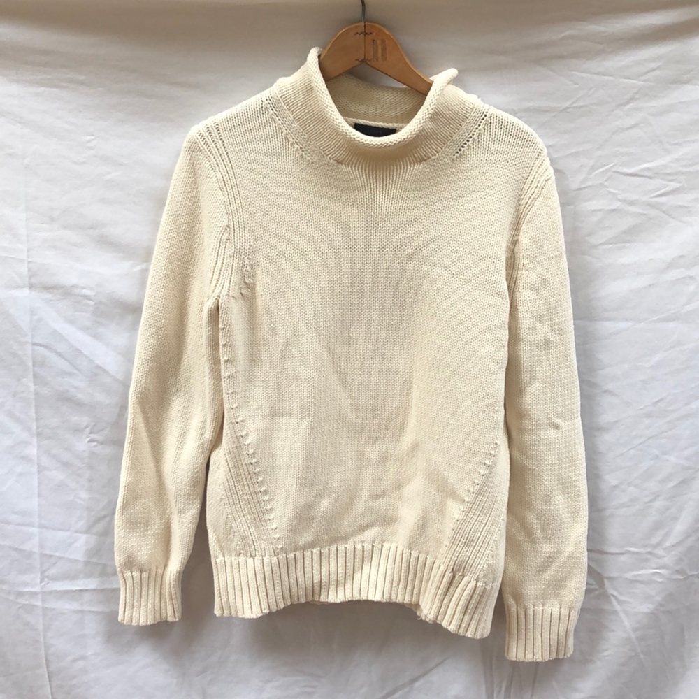 Off-white roll-neck sweater